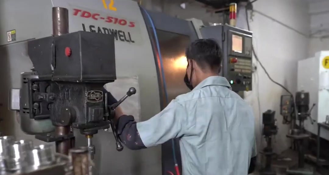 An operator at a Leadwell vertical machining centre