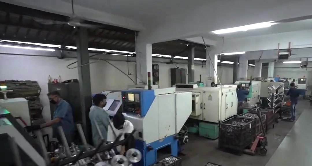 CNC turning machines with their operators